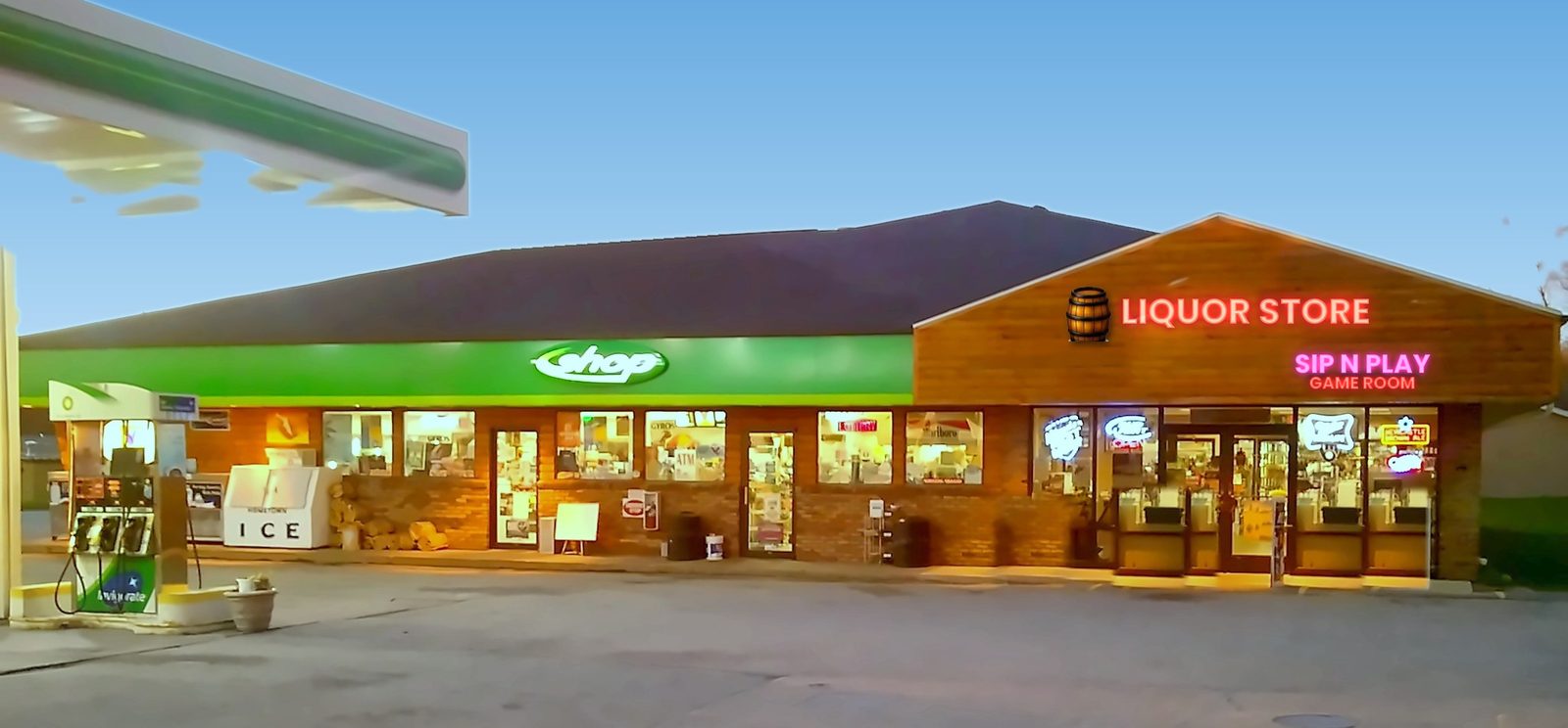 The Beer Barrel Liquor Store and Waupaca BP at 1070 W Fulton St